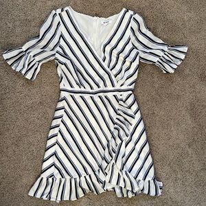 White dress with black and blue stripes